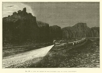 Eisenbahnstrecke beleuchtet durch eine elektrische Laterne